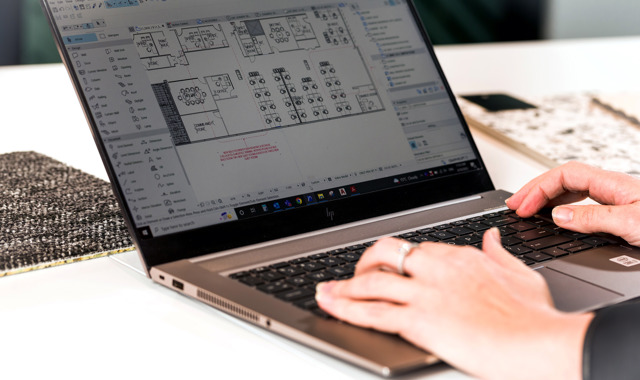 Close up of an office floor plan on a laptop screen